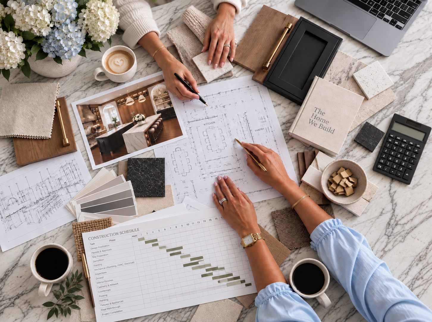 Hykal Homes design planning session with floor plans, material swatches, and construction schedule